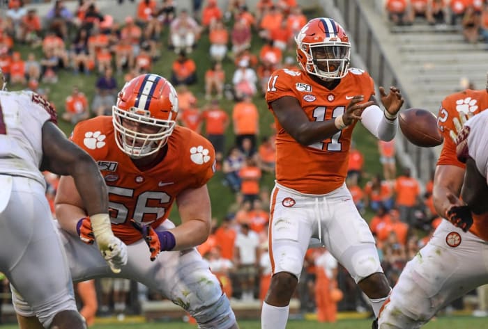Clemson offensive lineman Will Putnam(56) blocks near quarterback Taisun Phommachanh (11) during the fourth quarter at Memorial Stadium. (Ken Ruinard / staff, The Greenville News via Imagn Content Services, LLC.)